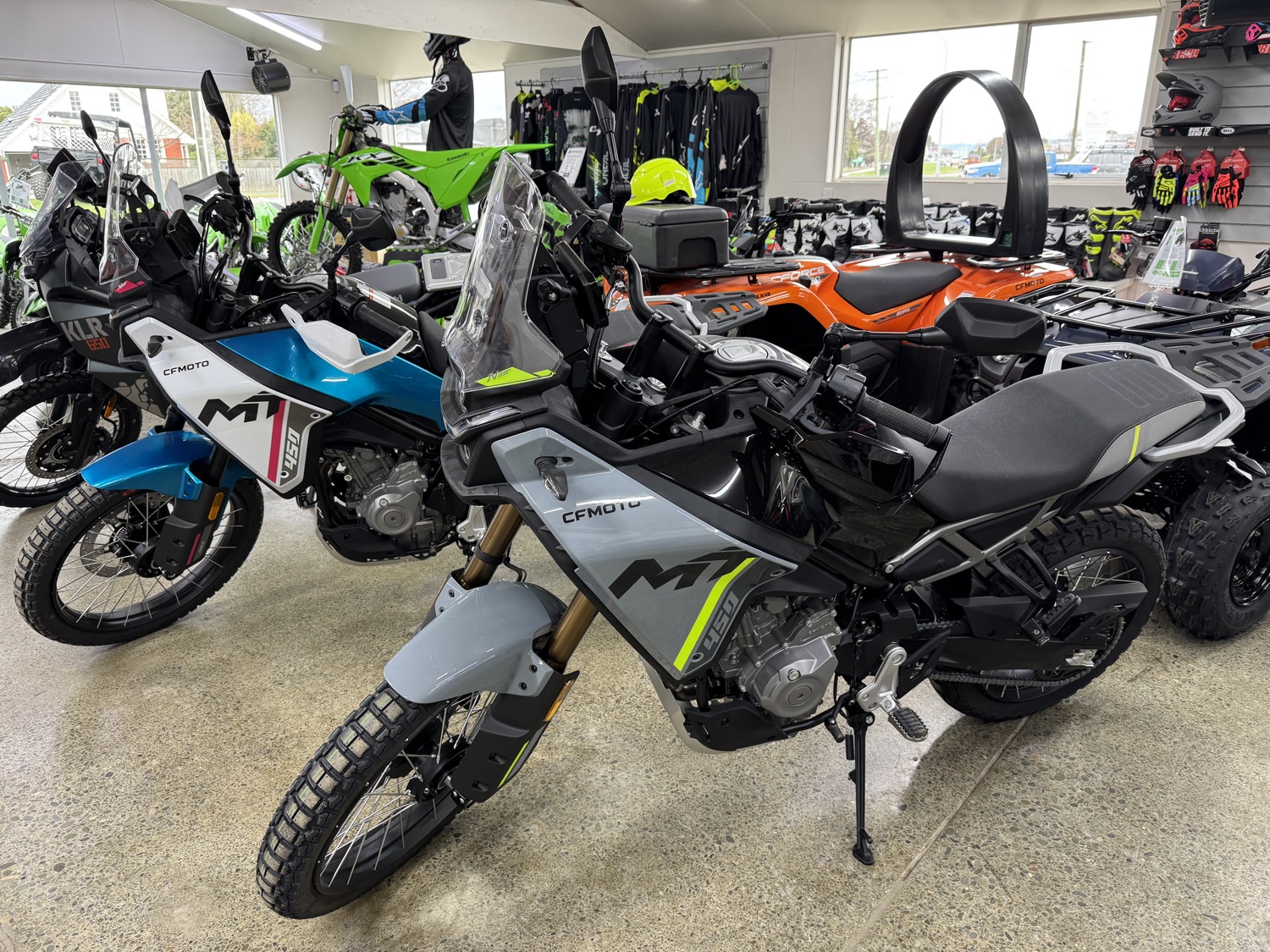 CF Moto adventure motorcycles in the showroom